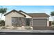 Charming single-story home with stone accents, a two-car garage and neutral color palette at 1892 E Empeltre Rd, San Tan Valley, AZ 85140
