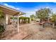 Enjoy this spacious backyard with mature landscaping, pergola, and lounge area at 1910 W Holly St, Phoenix, AZ 85009