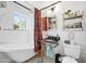 Bathroom with stand alone tub and patterned tile at 1910 W Holly St, Phoenix, AZ 85009