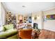 Inviting living room with a decorative fireplace, wood floors, and eclectic furnishings at 1910 W Holly St, Phoenix, AZ 85009