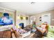 Spacious living room showcasing wood floors, a decorative fireplace, and a cozy atmosphere at 1910 W Holly St, Phoenix, AZ 85009