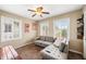 Bright living room with a grey sofa and large windows at 1910 W Holly St, Phoenix, AZ 85009