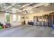 Spacious garage with storage cabinets and overhead lighting at 19672 N 260Th Ave, Buckeye, AZ 85396