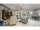 Comfortable living area with tile floors, plush seating, and sliding doors to the outside at 19672 N 260Th Ave, Buckeye, AZ 85396