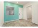 Inviting entryway with natural light, a modern front door, tiled flooring, and a neutral color palette at 23800 N 169Th Ave, Surprise, AZ 85387