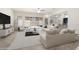 Bright and airy living room with sliding glass doors leading to the outdoor area, seamlessly blending indoor-outdoor living at 23800 N 169Th Ave, Surprise, AZ 85387