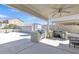 Large backyard featuring a built-in barbecue, basketball court, and plenty of space for outdoor activities at 25038 W Rancho Vista Dr, Buckeye, AZ 85326