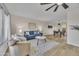 Stylish living room open to dining area, featuring modern furnishings and wood floors at 2604 W Wolf St, Phoenix, AZ 85017