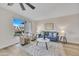 Cozy living room with a large window, modern furniture, and an area rug at 2604 W Wolf St, Phoenix, AZ 85017