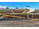 Designated covered parking spot within a community setting with visible unit number and well-maintained grounds at 2604 W Wolf St, Phoenix, AZ 85017