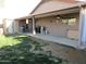 Enjoy the outdoors with this backyard featuring a covered patio, privacy fence, and shed at 3004 W Running Deer Trl, Phoenix, AZ 85083