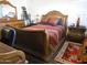 Bedroom with a stylish sleigh bed, complementary furnishings, and cozy decor at 3004 W Running Deer Trl, Phoenix, AZ 85083