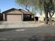 Charming single-story home with a well-maintained yard, two-car garage and tile roof at 3004 W Running Deer Trl, Phoenix, AZ 85083
