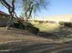 The property features low-maintenance landscaping with mature trees, shrubs, and decorative gravel at 3004 W Running Deer Trl, Phoenix, AZ 85083