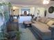Comfortable living room featuring a large sectional sofa and stylish decor at 3004 W Running Deer Trl, Phoenix, AZ 85083