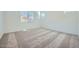 Cozy bedroom with soft carpeting, recessed lighting, and natural light from the window at 3252 W Peak View Rd, Phoenix, AZ 85083