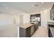 Bright, open kitchen flows seamlessly into the living area, perfect for entertaining at 3252 W Peak View Rd, Phoenix, AZ 85083