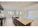 Stylish kitchen with a large island, perfect for food preparation and casual dining at 3252 W Peak View Rd, Phoenix, AZ 85083