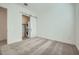 Conveniently located laundry closet with a stacked washer and dryer at 3252 W Peak View Rd, Phoenix, AZ 85083