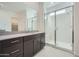 Bathroom with a vanity, and an enclosed glass shower featuring elegant finishes at 3252 W Peak View Rd, Phoenix, AZ 85083