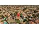 A captivating aerial view showing a home with a pool, landscaped backyard and location pin at 3620 N Aspen Dr, Avondale, AZ 85392