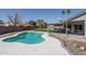 Backyard features a covered patio, and an in-ground pool perfect for outdoor enjoyment at 3620 N Aspen Dr, Avondale, AZ 85392
