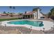 Home featuring an in-ground pool, covered patio, and low-maintenance landscaping at 3620 N Aspen Dr, Avondale, AZ 85392