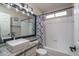 Bathroom featuring a modern vanity with a vessel sink and a bathtub shower combo at 3620 N Aspen Dr, Avondale, AZ 85392