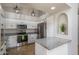 Well-lit kitchen featuring granite countertops, stainless steel appliances, and recessed lighting at 3620 N Aspen Dr, Avondale, AZ 85392