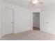 Bright bedroom features carpet flooring, two doors, and recessed lights at 405 E Wescott Dr, Phoenix, AZ 85024