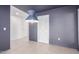 The dining room is attached to kitchen with tile flooring and a modern blue pendant light fixture at 405 E Wescott Dr, Phoenix, AZ 85024