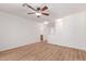 Spacious living room boasts wood-look flooring, recessed lighting, and an open layout at 405 E Wescott Dr, Phoenix, AZ 85024