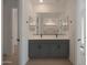 Bathroom with dual sinks and a tile floor at 4050 W Nora Dr, San Tan Valley, AZ 85144