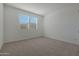 Bedroom featuring neutral carpet, a window with blinds and neutral paint at 4050 W Nora Dr, San Tan Valley, AZ 85144