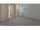 Bedroom with neutral carpet, closet and window with blinds at 4050 W Nora Dr, San Tan Valley, AZ 85144
