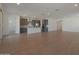 Open-concept living space featuring a kitchen with a large island and modern appliances at 4050 W Nora Dr, San Tan Valley, AZ 85144