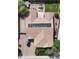 Stunning aerial view of a tile roof home featuring solar panels, green lawn and outdoor living space at 4318 N 180Th Dr, Goodyear, AZ 85395