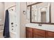 Bathroom with a shower/tub, tile floors, and a vanity with double mirrors at 4318 N 180Th Dr, Goodyear, AZ 85395