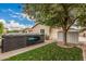 Backyard with a modern hot tub and storage shed, perfect for relaxation and outdoor enjoyment at 4318 N 180Th Dr, Goodyear, AZ 85395