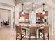 Open kitchen with an island, pendant lighting, and stainless steel appliances at 4318 N 180Th Dr, Goodyear, AZ 85395