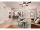 Open concept living room showcasing a kitchen and comfortable seating area at 4318 N 180Th Dr, Goodyear, AZ 85395