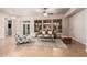 Bright living room with shuttered windows, comfortable seating, and neutral colors at 4318 N 180Th Dr, Goodyear, AZ 85395