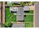Overhead view of a home with a well-maintained roof, green lawns, and a neat backyard layout at 4809 N 30Th Pl, Phoenix, AZ 85016