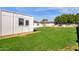 Lush backyard featuring a well-maintained lawn and a modern, minimalist exterior, ideal for relaxation and outdoor activities at 4809 N 30Th Pl, Phoenix, AZ 85016