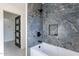 This primary bathroom features designer tile and built in niche at 4809 N 30Th Pl, Phoenix, AZ 85016