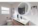This bathroom has an illuminated mirror, sleek hardware, and modern vanity at 4809 N 30Th Pl, Phoenix, AZ 85016