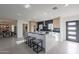 Modern kitchen with an island, breakfast bar seating, and stainless steel appliances at 4809 N 30Th Pl, Phoenix, AZ 85016