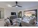 Bright living room with a ceiling fan, sliding glass doors, and comfortable seating at 4809 N 30Th Pl, Phoenix, AZ 85016