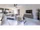 Open concept living room showcasing a modern aesthetic, a ceiling fan, and neutral tones at 4809 N 30Th Pl, Phoenix, AZ 85016