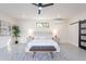 Bright main bedroom features recessed lights, ceiling fan, art and a window view at 4809 N 30Th Pl, Phoenix, AZ 85016